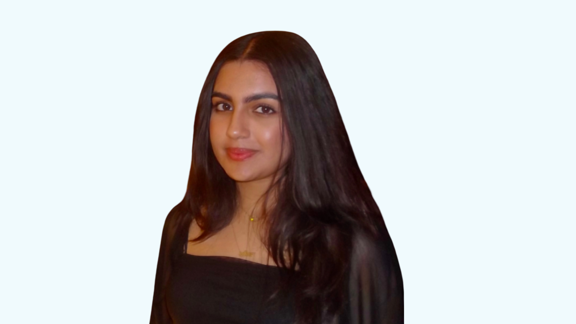 Portrait of a woman with long dark hair wearing a black top, smiling slightly, against a light background.